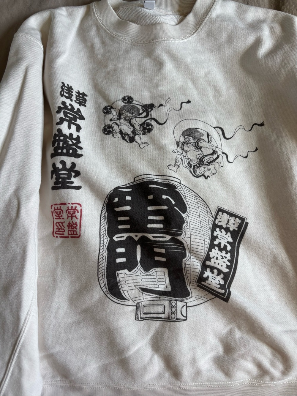 From Uniqlo Tokyo. Cream Graphic Crewneck Sweatshirt - Picture 6 of 6